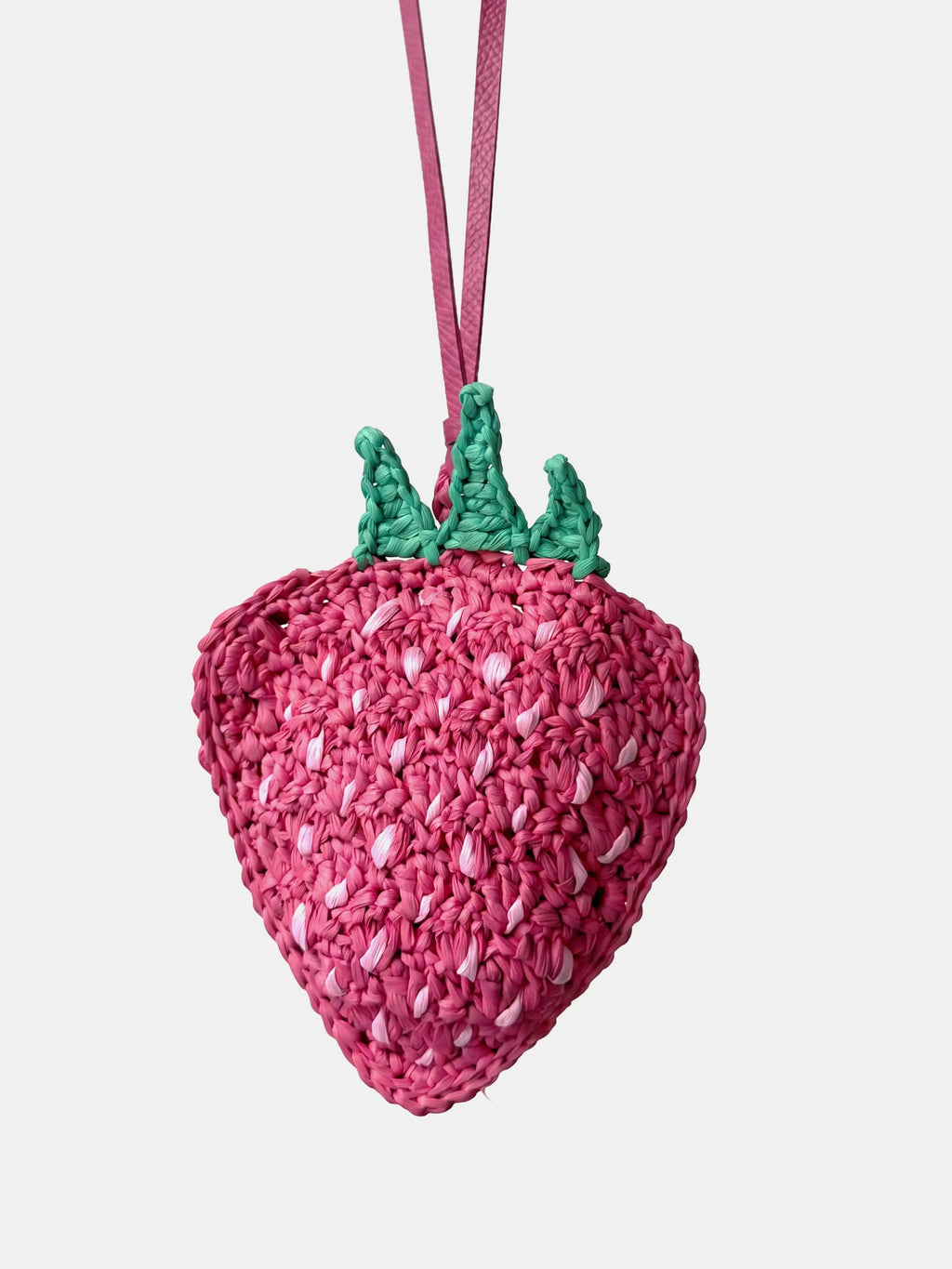 a pink strawberry charm and earbuds pouch