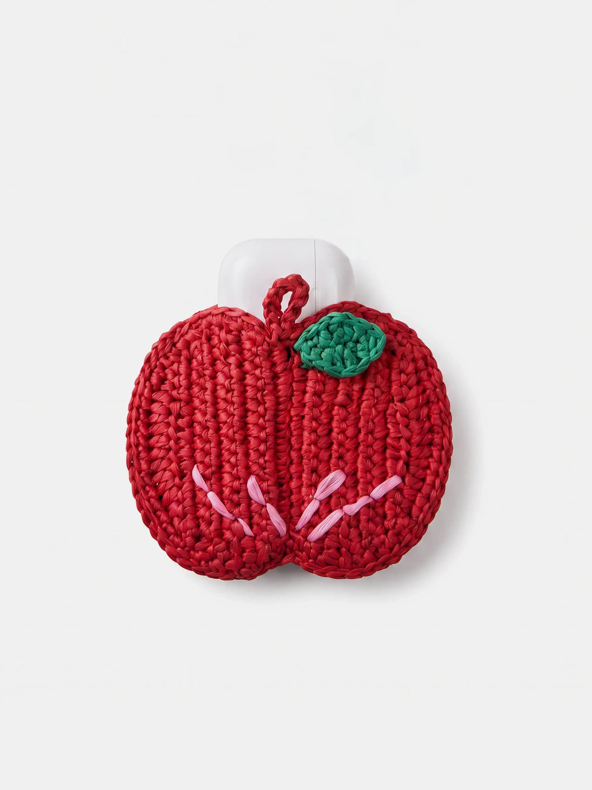 a red apple charm that holds AirPods Pro